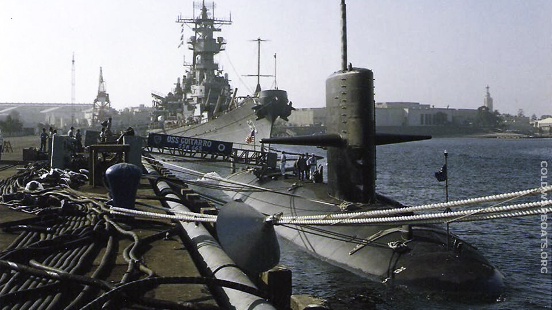 The USS GUITARRO (SSN 665) pierside at North Island, San Diego, CA, with the USS MISSOURI (BB 63).